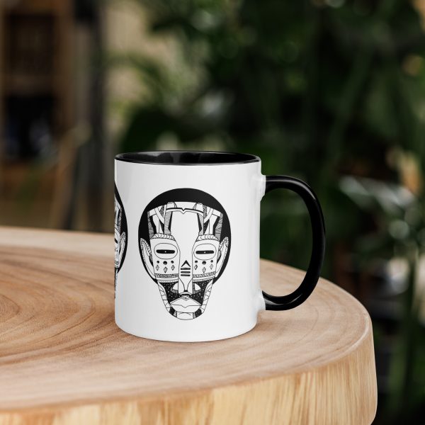 Afrocentric African mask coffee mug with colorful rim, handle, and interior for your morning ritual
