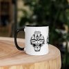 Afrocentric coffee mug featuring African Mask 4 custom art with a colorful rim, handle, and interior
