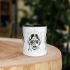 Ceramic Afrocentric coffee mug with African Mask 12 art design and colorful rim, handle, and interior