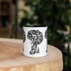 Afrocentric coffee mug featuring Her Beautiful Mind artwork with colorful rim, handle, and interior