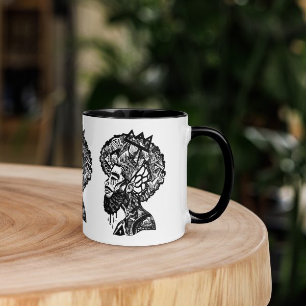 Afrocentric coffee mug featuring colorful Melancholic Mind artwork with a vibrant rim, handle, and interior