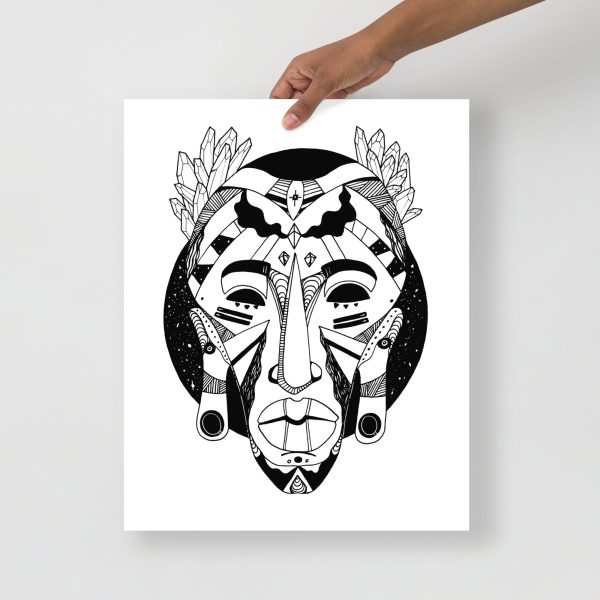 Hand holding black ink african mask art print of tribal mask drawing.