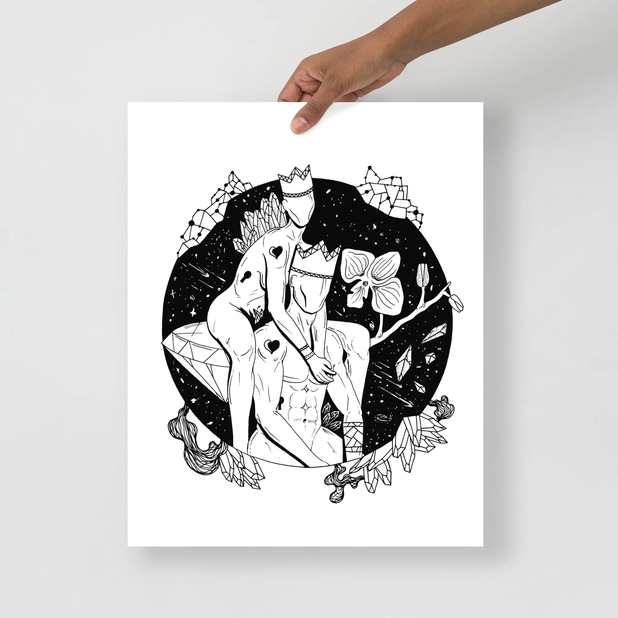 Romantic couple art featuring divine feminine figures with crowns and flowing organic elements in circular composition, shown as a hand-held print