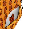 Orange and black African mask backpack with tribal print and water-resistant material