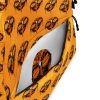Orange and black African mask tribal backpack with laptop pocket and water-resistant material