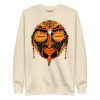 Orange and black African mask print sweatshirt with ribbed crew neck and long sleeves