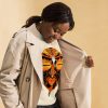 Orange and black African mask graphic sweatshirt with ribbed crew neck and long sleeves