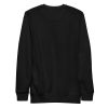 Orange and black African mask print crewneck sweatshirt with ribbed cuffs and soft fleece interior