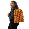 Orange Día de Muertos skull backpack with laptop pocket and water-resistant material for daily use