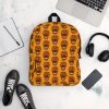 Orange Day of the Dead skull backpack with water-resistant material and laptop pocket