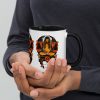 Orange and black Libra zodiac coffee mug with colorful rim, handle, and interior