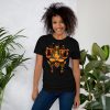 Women's Libra zodiac t-shirt in orange and black featuring divine balance scales design