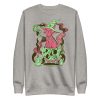Pink and green Magical Cat of Fortune drawing on a ribbed crew neck sweatshirt