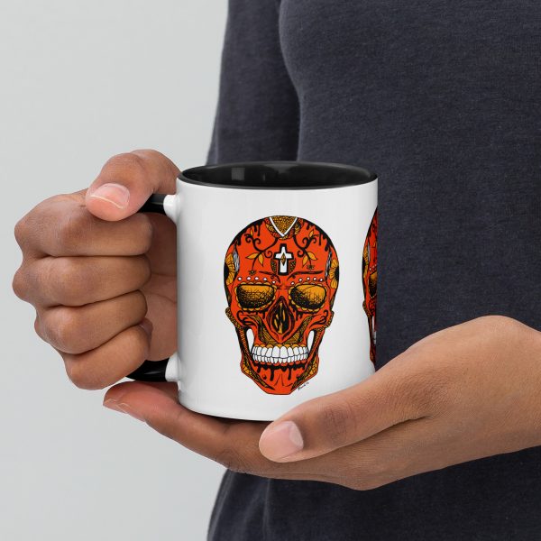 Day of the Dead sugar skull coffee mug in black and orange with colorful rim and handle