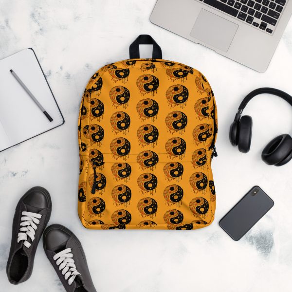 Orange and black yin yang backpack with laptop pocket and water-resistant material