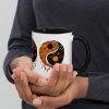 Orange and black yin yang coffee mug with colorful rim, handle, and interior for fall