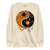 Orange and black yin yang sweatshirt with ribbed crew neck and long sleeves for fall streetwear