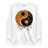 Orange and black yin yang sweatshirt with ribbed crew neck and long sleeve cuffs