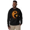Orange and black yin yang sweatshirt with ribbed crew neck and long sleeves
