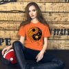 Orange and black yin yang t-shirt with circle graphic for fall casual style