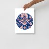 Pink skull artwork print on matte museum-quality paper displayed at an angle