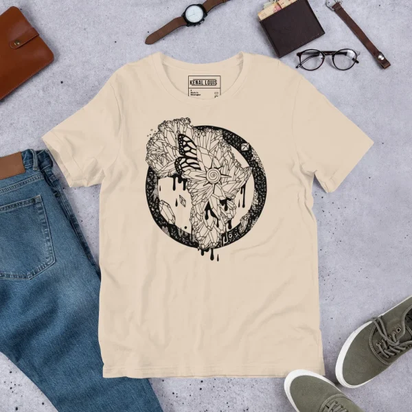 Cream Africa graphic t-shirt featuring bold black botanical circle design with butterfly and dripping details