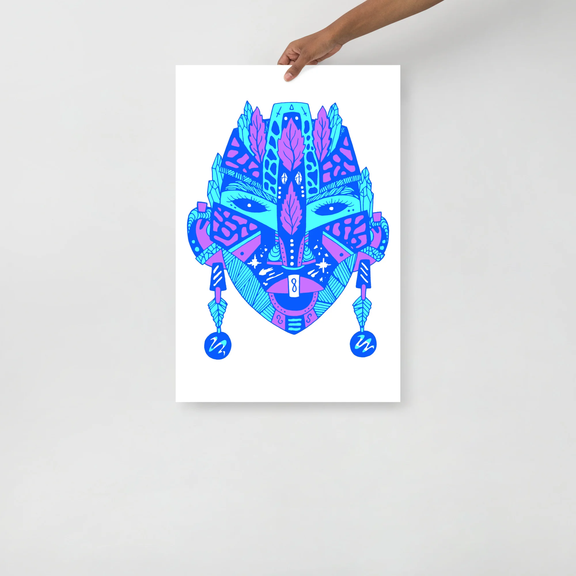 Blue and pink abstract African mask art print with geometric leaf patterns and dangling ornaments on white background.