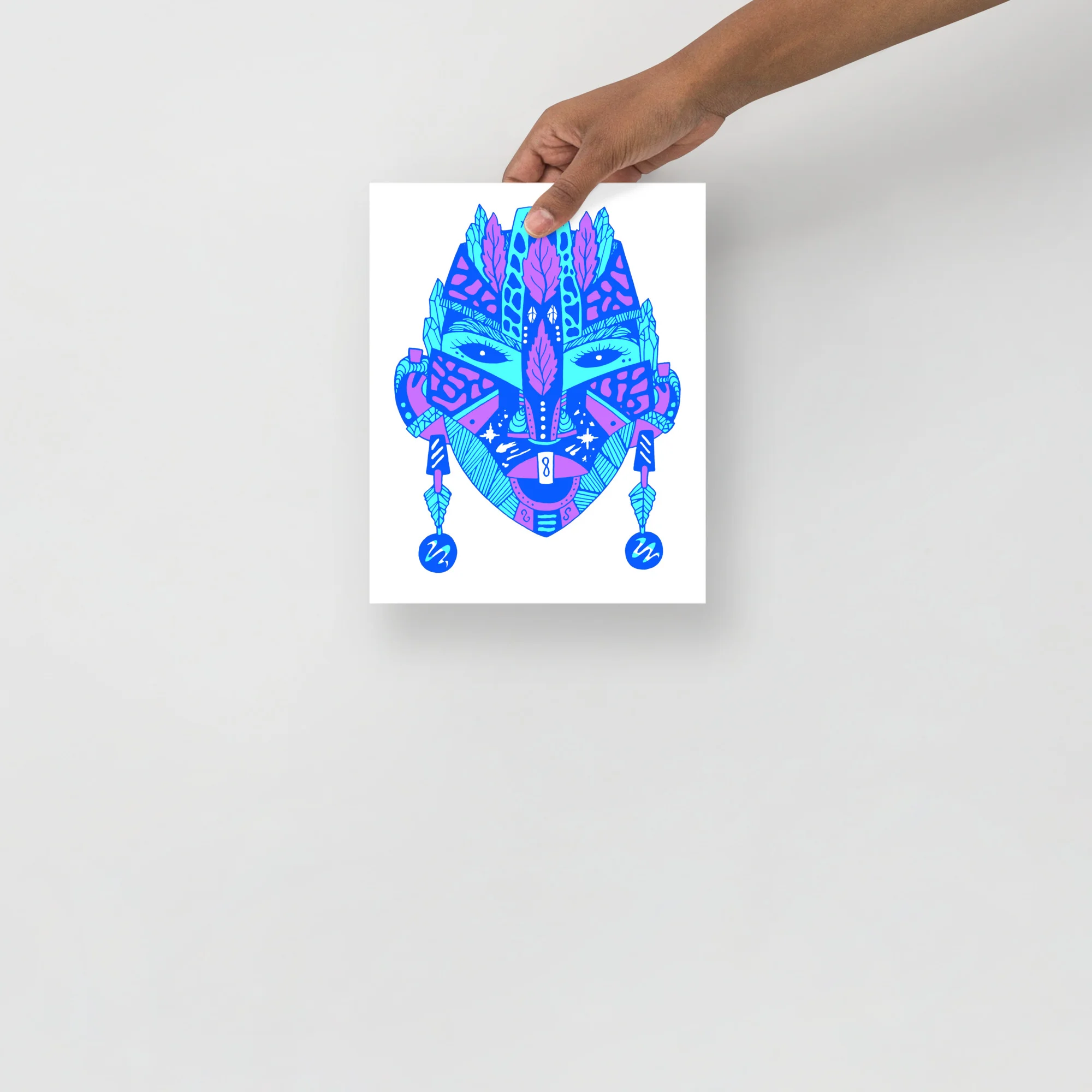 Vibrant blue and magenta abstract African mask art print with geometric patterns and ornamental details on white paper