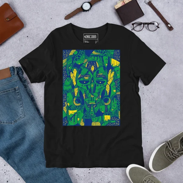 Black African mask art t-shirt with vibrant green, blue, and yellow afrocentric design displayed flat lay with accessories