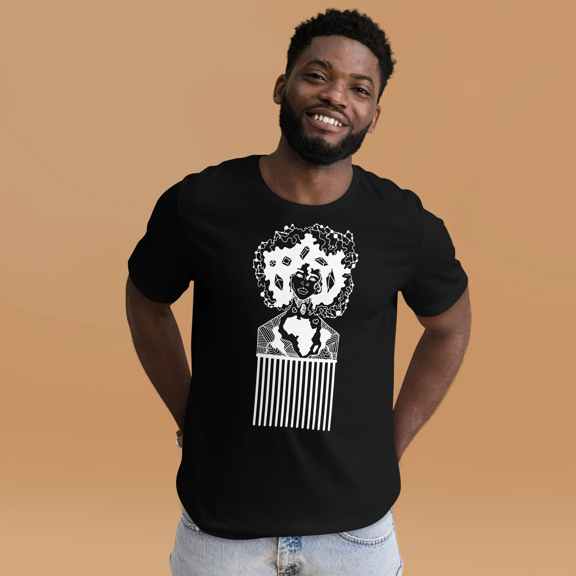 Man wearing black afro hair pick t-shirt with white line art design featuring African-inspired imagery and comb graphic