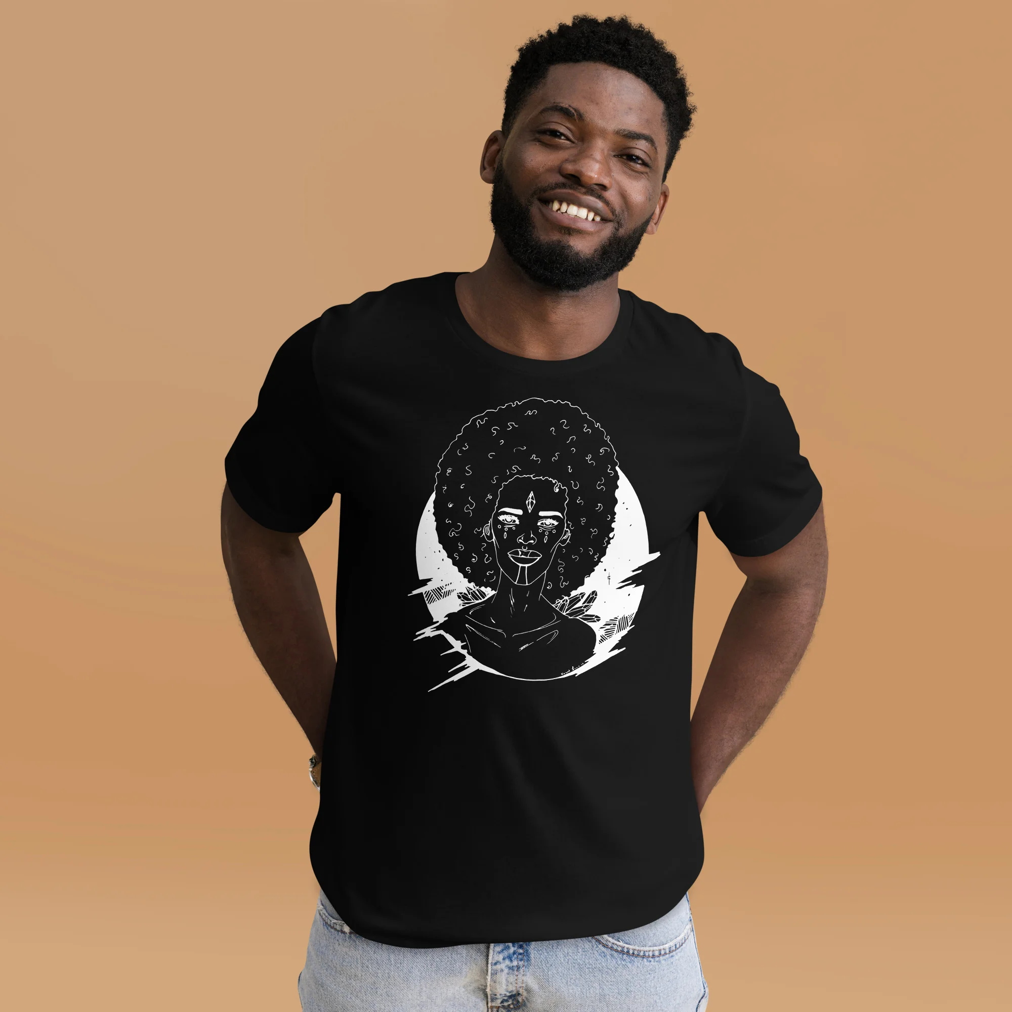 Man wearing black afrocentric line art t-shirt featuring cosmic afro eve design with celestial linework on tan background