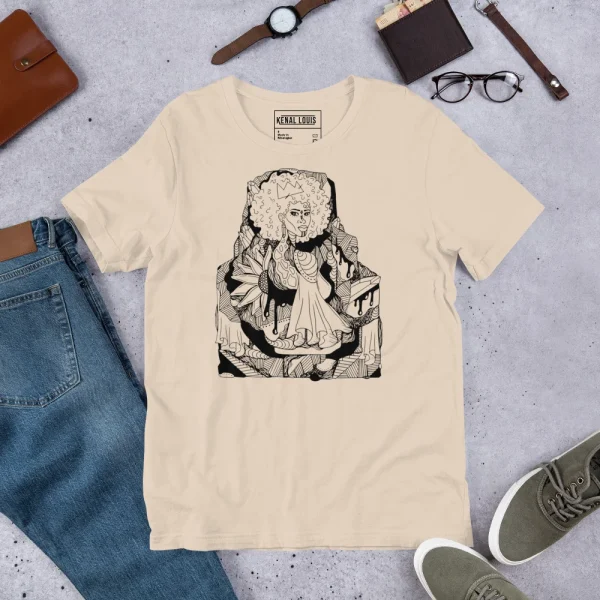 Cream afrocentric t-shirt with black graphic illustration of a figure, displayed flat lay with accessories