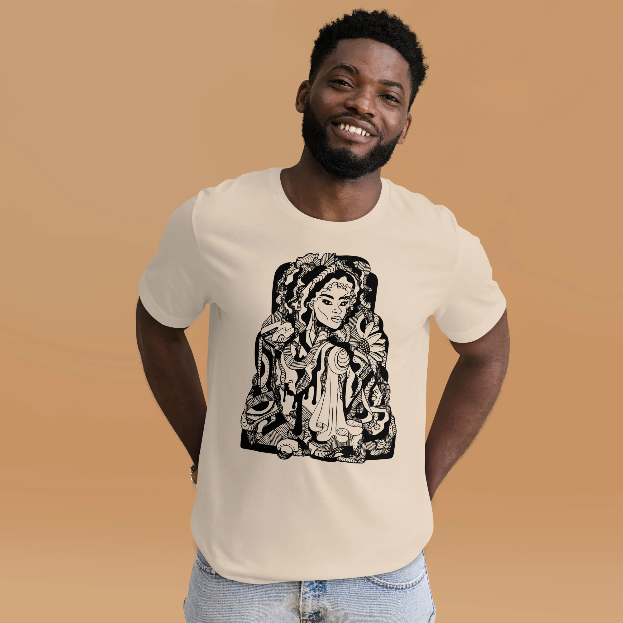 Man wearing cream afrocentric t-shirt with black Mirage design featuring cultural artwork