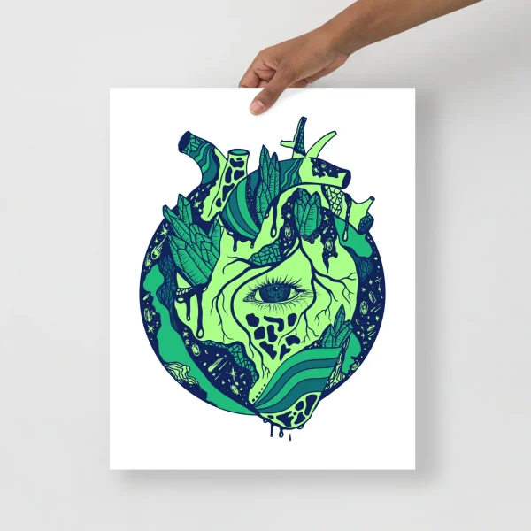 Anatomical heart art print featuring cosmic green and navy blue design with celestial and botanical elements on white background