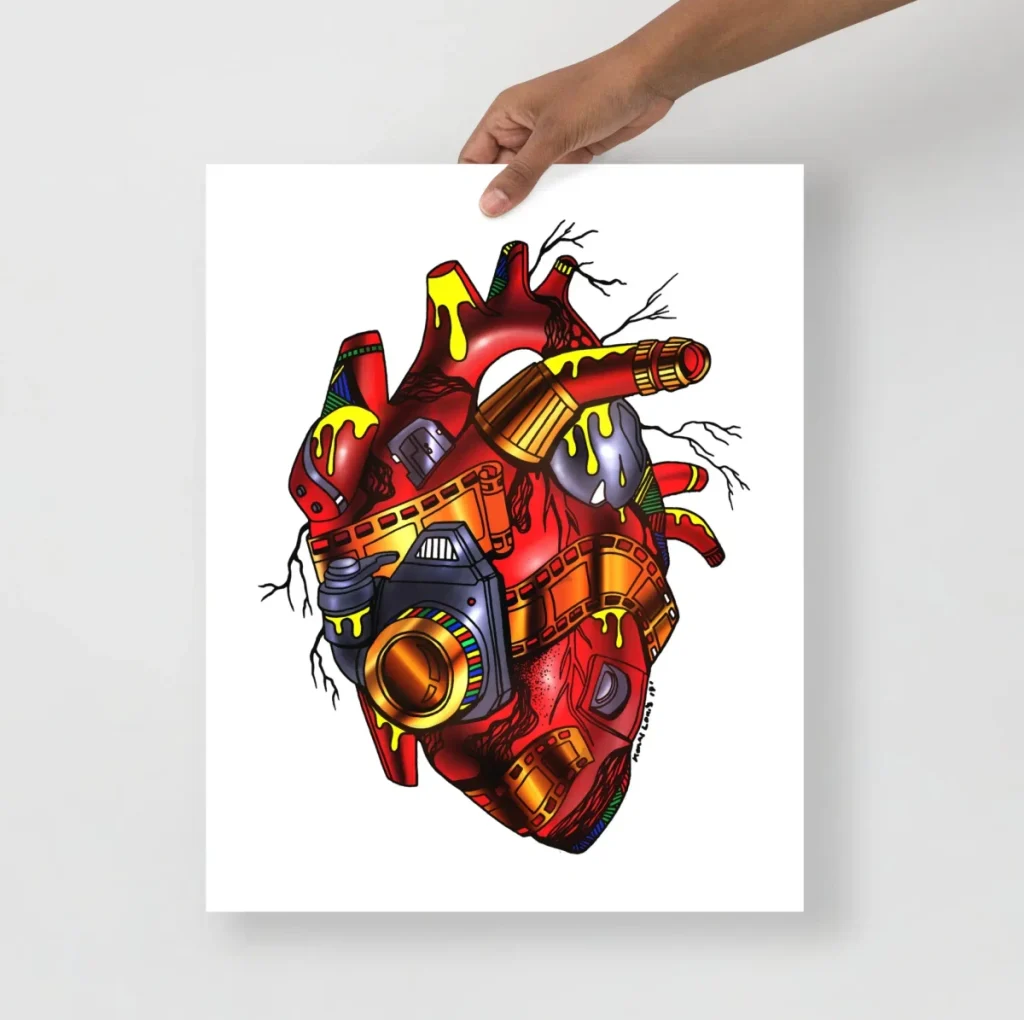 Vivid red anatomical heart art print celebrating photographers with a creative camera-inspired twist
