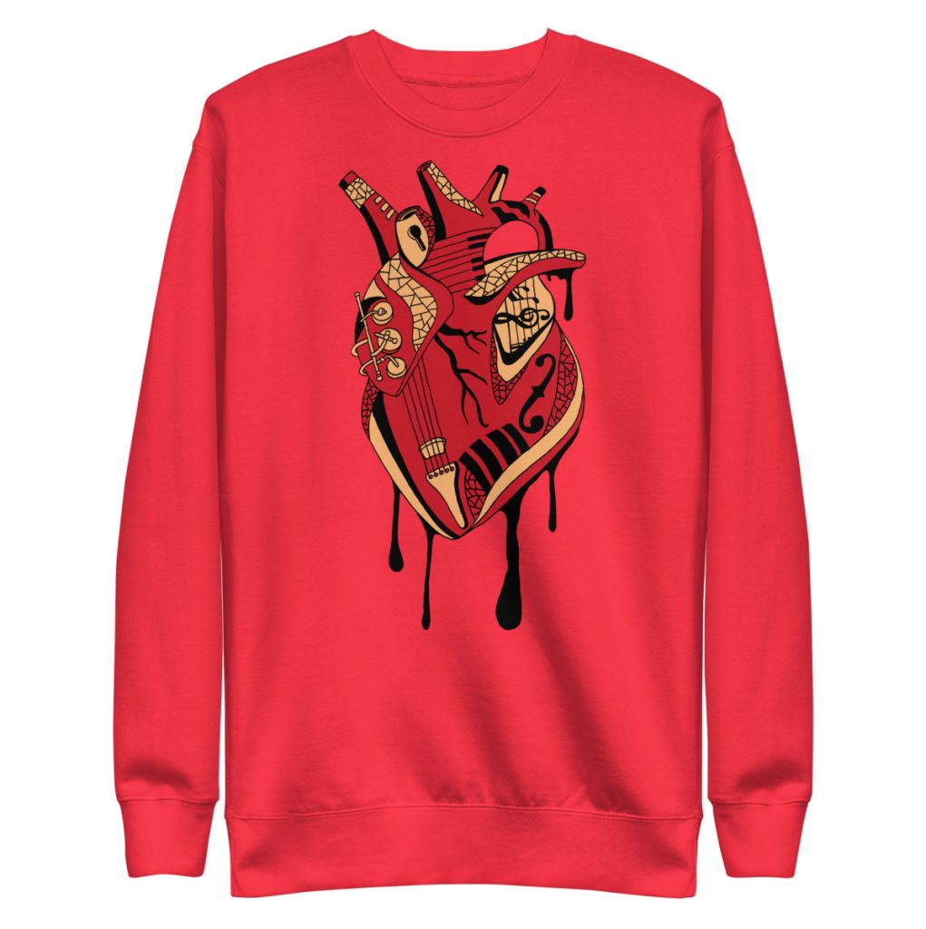 Crewneck anatomical heart sweatshirt blending red cream tones with musical note details