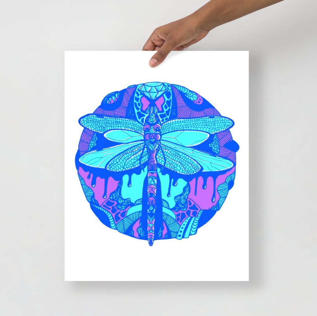 Blue dragonfly hovering within a decorative circle in detailed line art