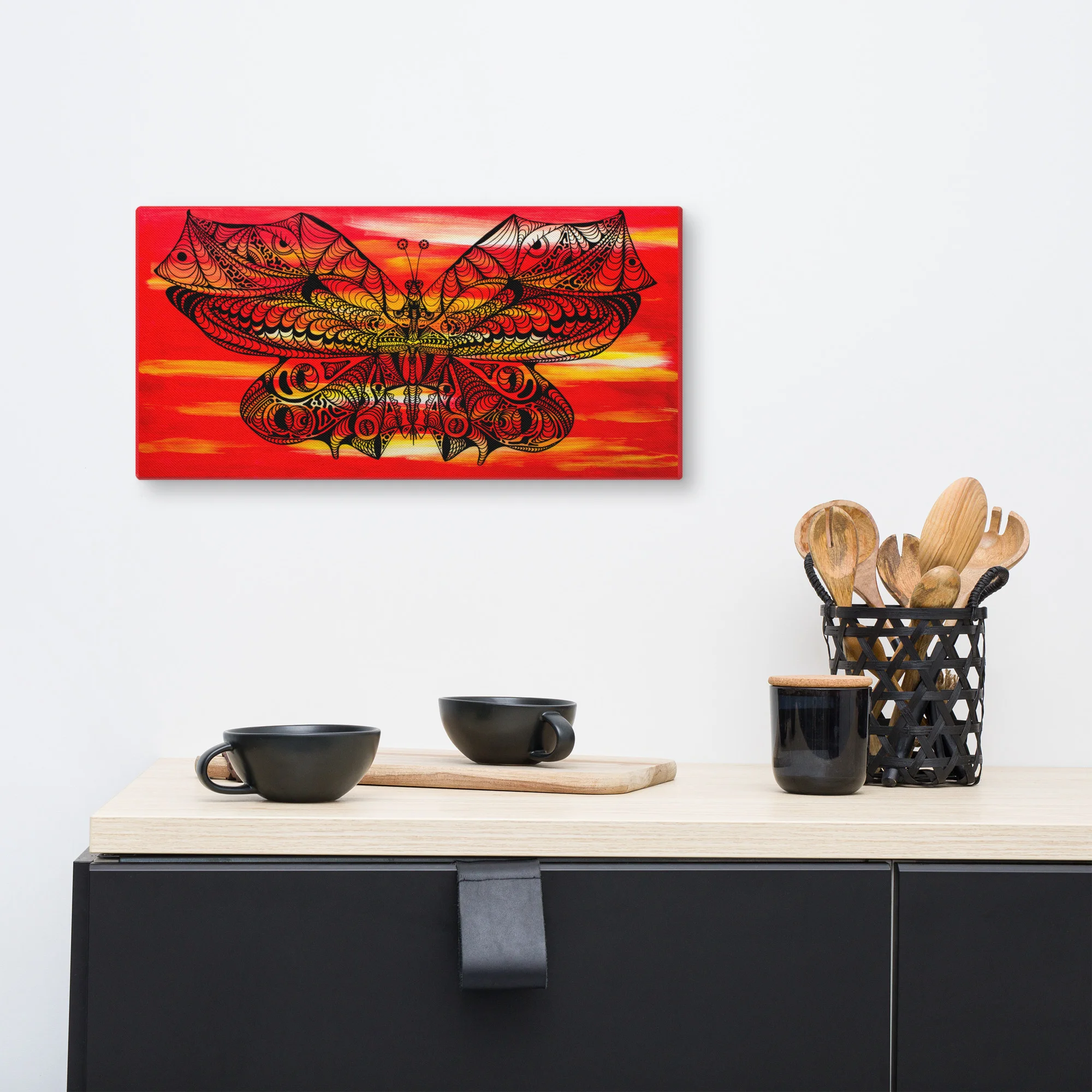 Butterfly line art canvas featuring intricate patterned wings against a vibrant red and orange sunset background