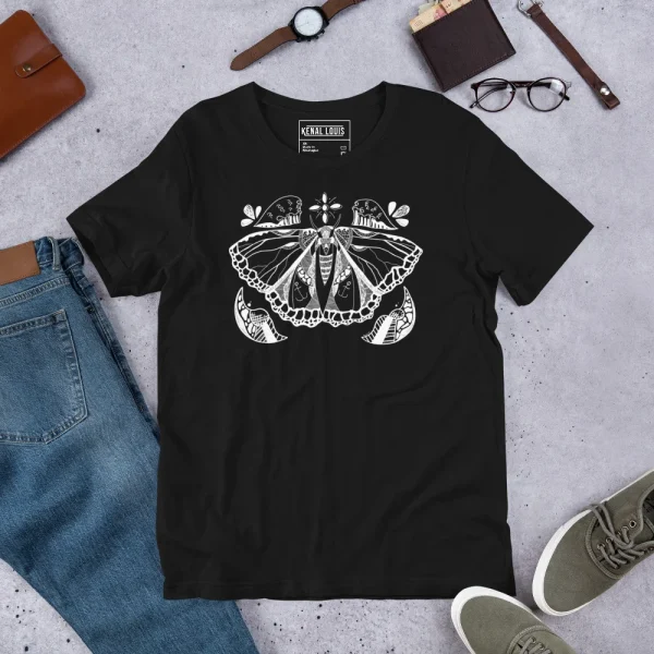 Black butterfly t-shirt with white line art graphic featuring a symmetrical butterfly design and decorative elements