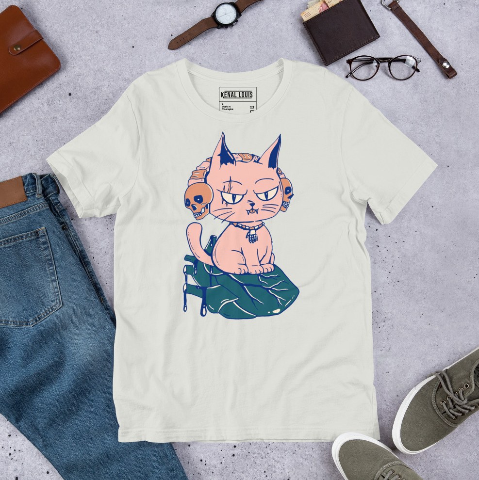 Soft pink shirt showcasing a mischievous cat on a heart whimsical cat lover apparel