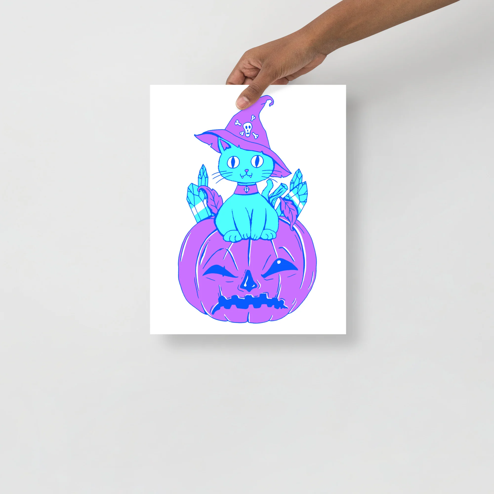 Vibrant neon blue and purple witch cat sitting on a jack-o-lantern pumpkin art print with magical crystal details