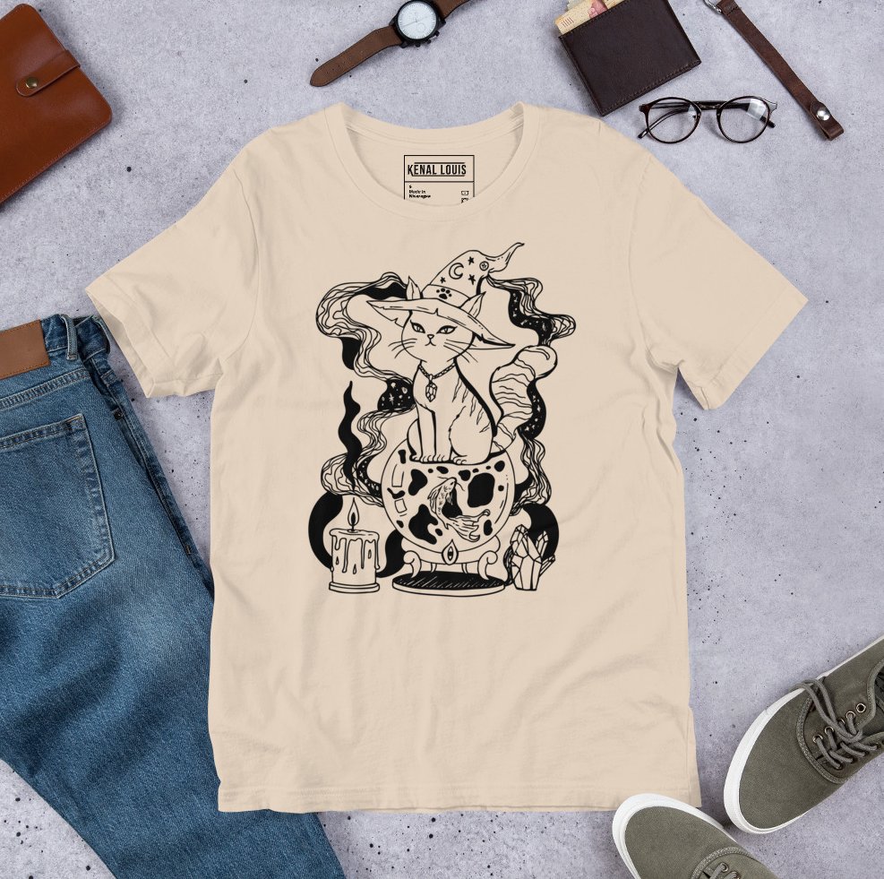 Whimsical magical fortune cat design on a unisex cotton shirt with mystical details