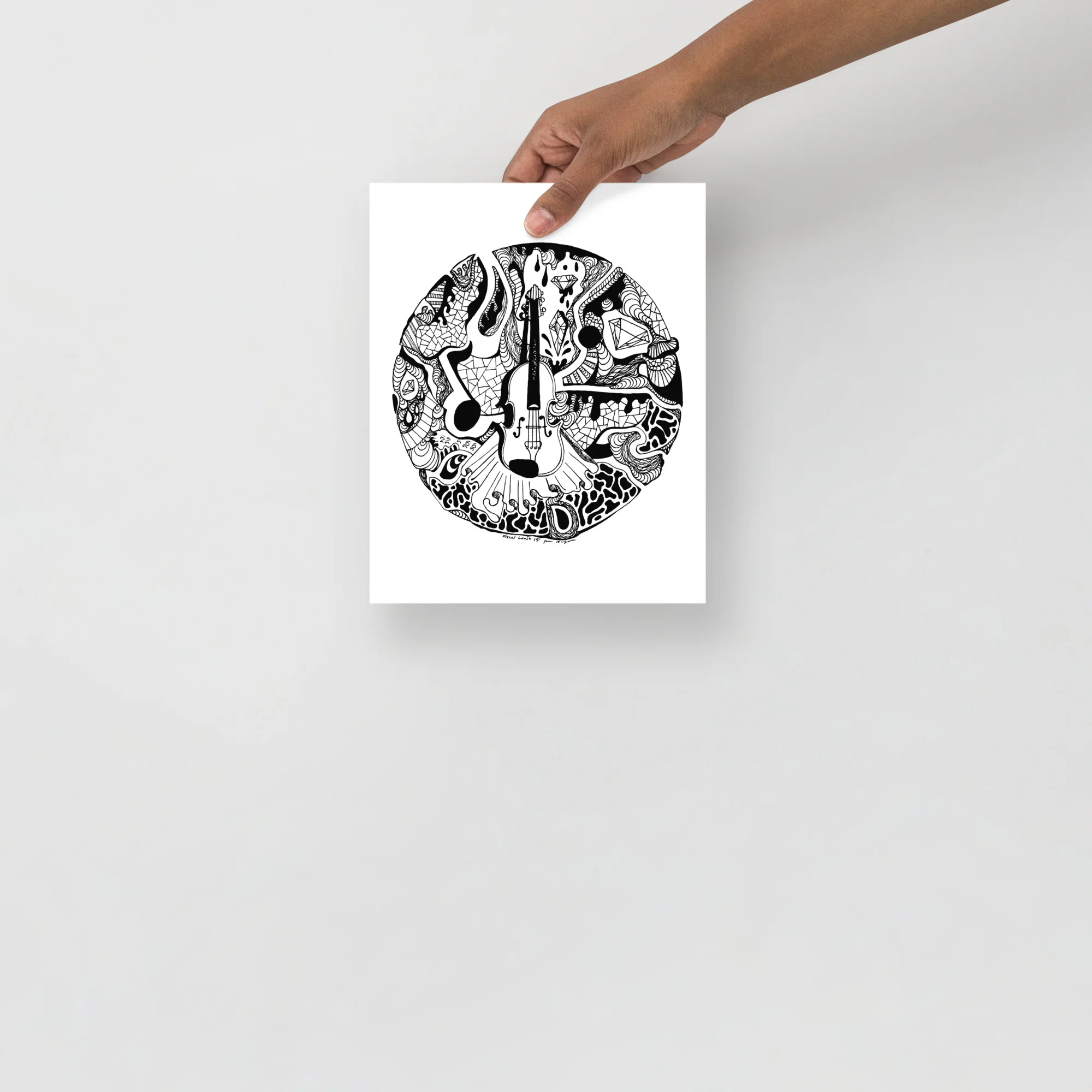 Circular black and white circle of music wall art print featuring intricate violin and musical instrument designs