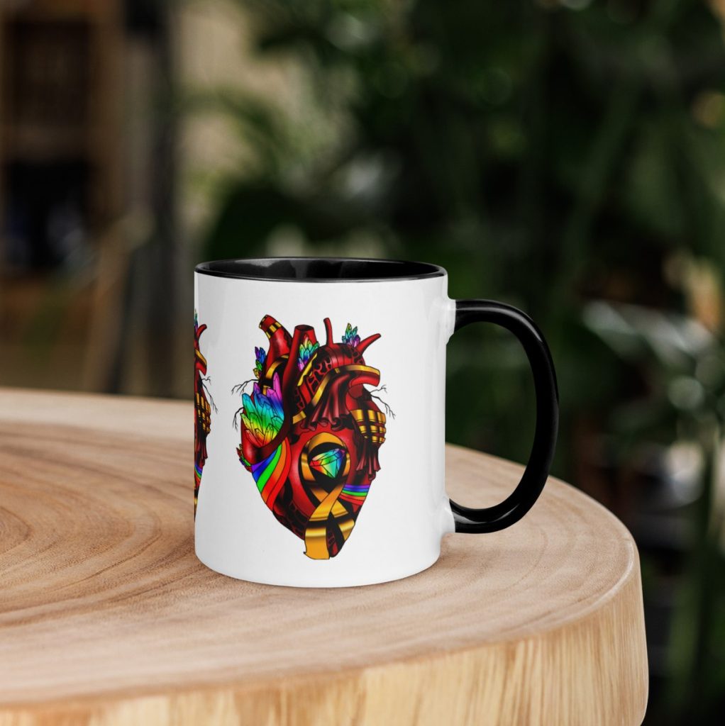 Pride awareness ceramic mug with rainbow heart celebrating LGBTQ coffee lover gifts