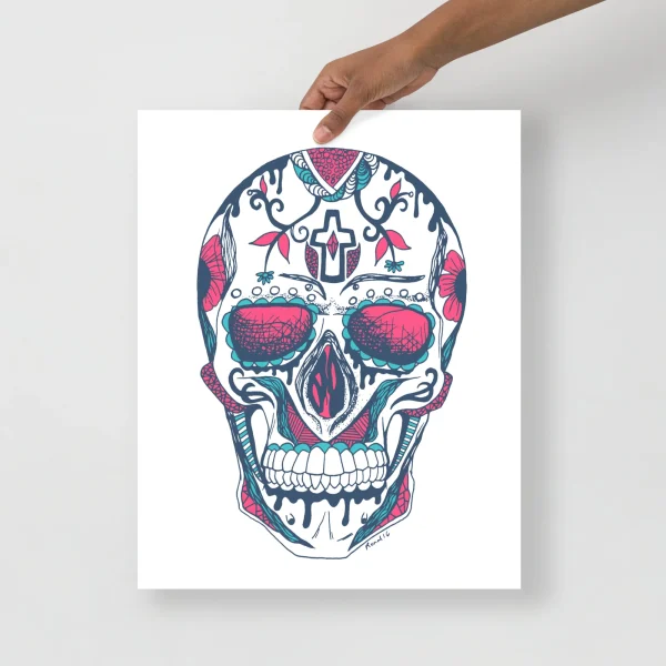Day of the dead skull art print featuring ornate pink and teal floral patterns with a central cross design on white background.