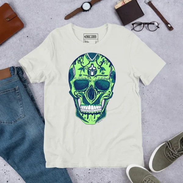 Cream day of the dead skull t-shirt with green and navy graphic featuring ornate cross and floral details