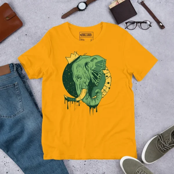 Golden yellow elephant t-shirt featuring a green crowned elephant illustration with abstract circular design and dripping accents