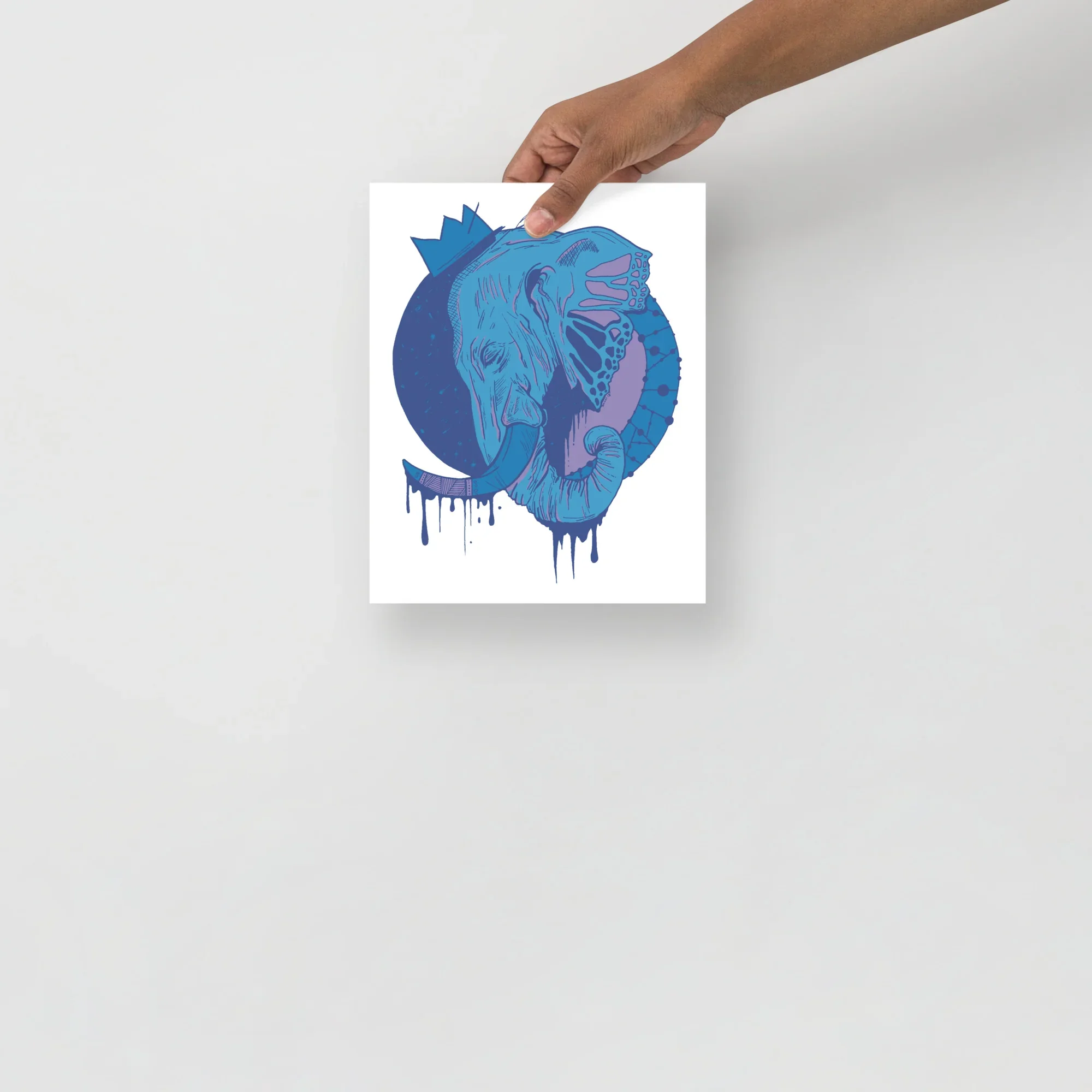 Royal elephant wall art in teal and coral with dripping paint effect and crown detail on white background.