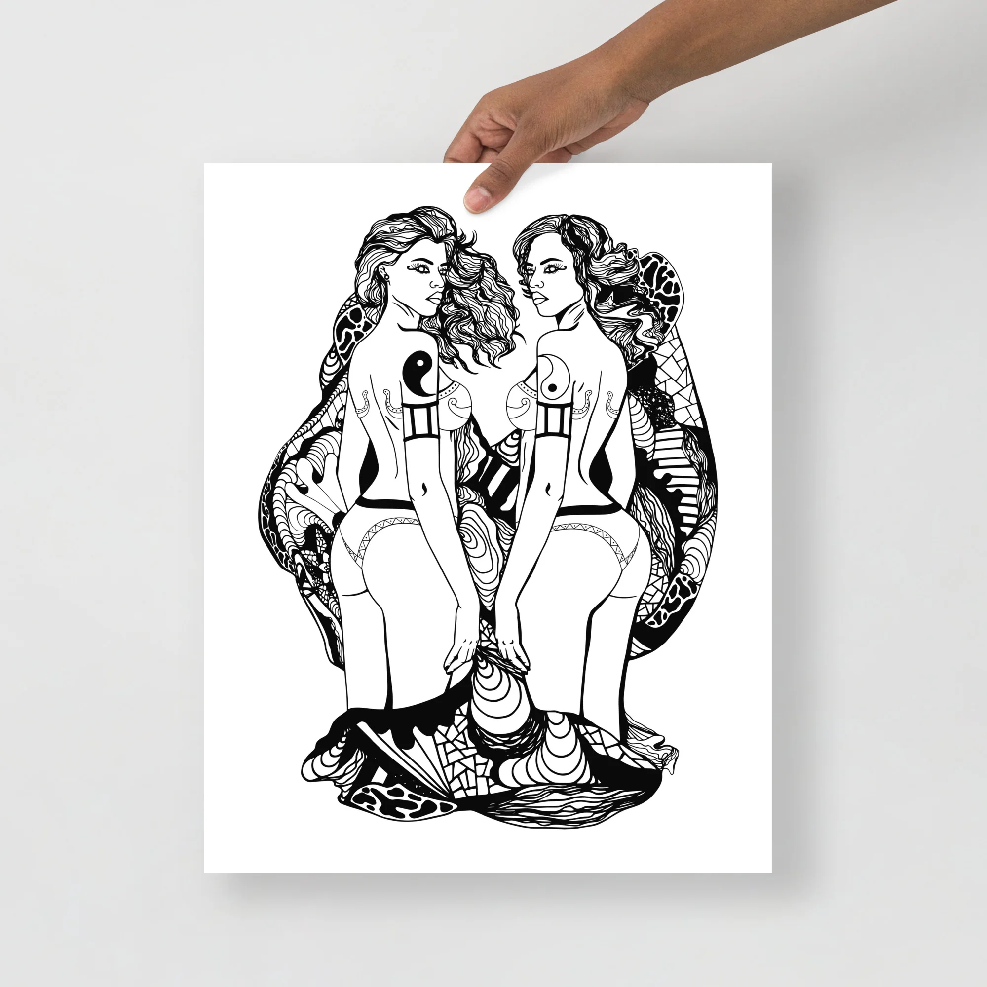 Gemini artwork featuring two feminine figures with flowing hair and intricate line art designs, each with yin-yang symbols over their hearts.