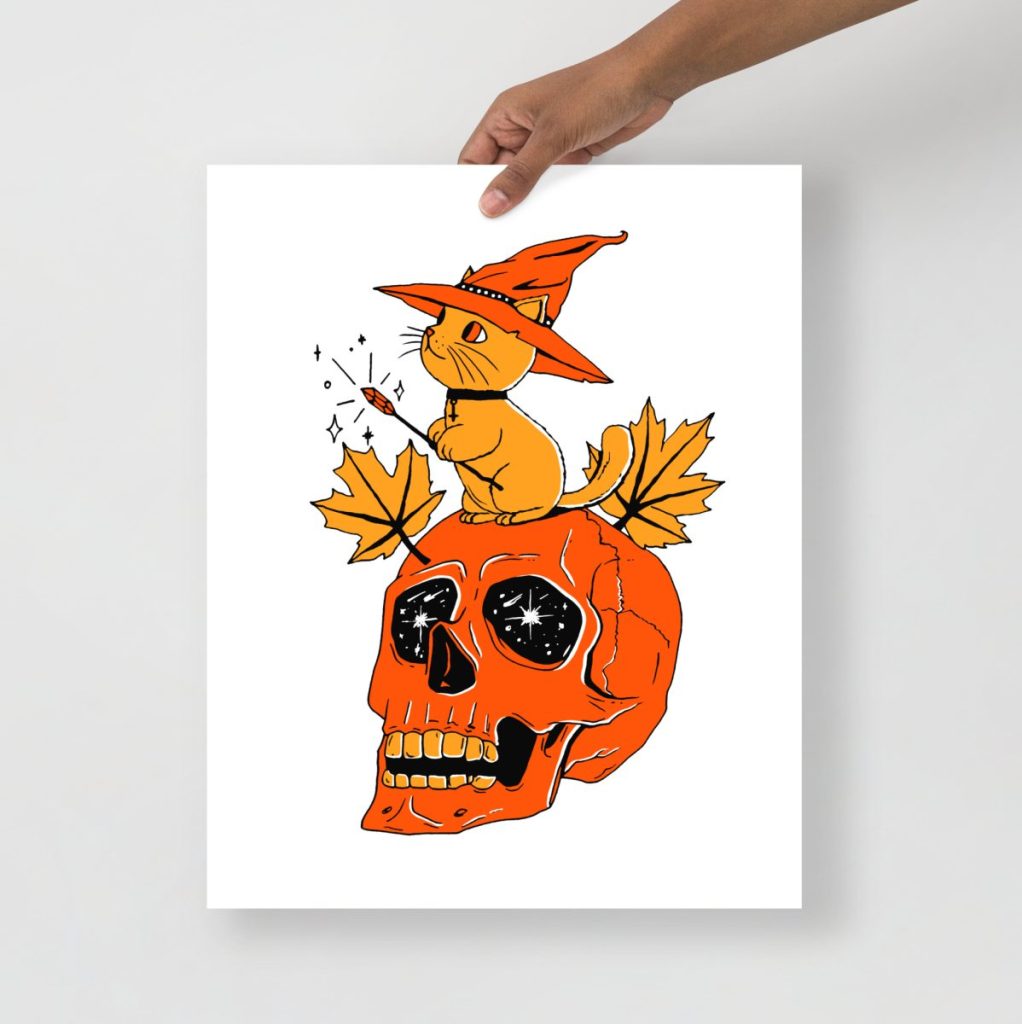 Magical black and orange cat alongside a skull in a striking halloween art collection